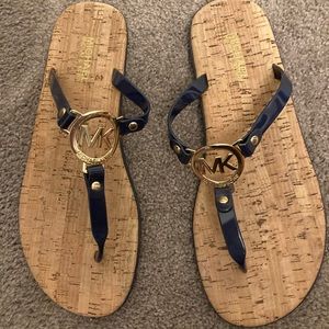 Michael Kors ladies flip flops.    Navy, size 9